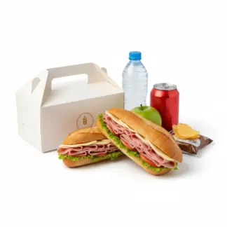 Box Lunch - Baguett jamón y queso (incluye agua o refresco, fruta de mano y papas.)